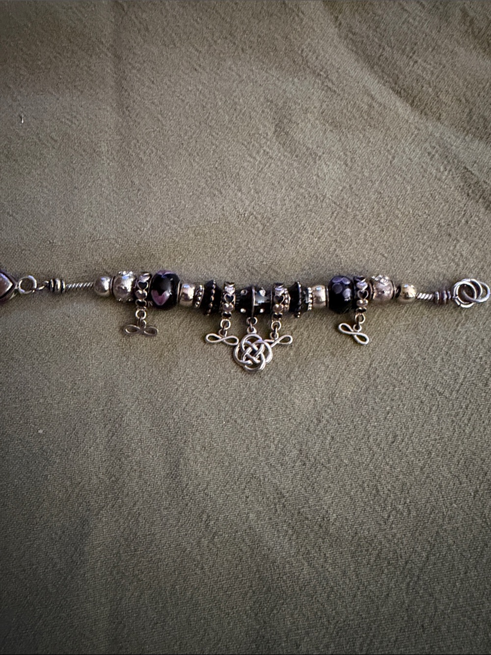 Silver-Tone Bracelet with Dark Purple Faceted Beads and Celtic Charm